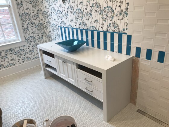 white kitchen countertop with blue sink
